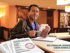 Kemal Kaya vize evrakları ve yeminli tercüme dosyalarını hazırlarken.